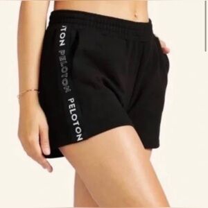 FA121 Peloton Uptown Short in black with white letters size L